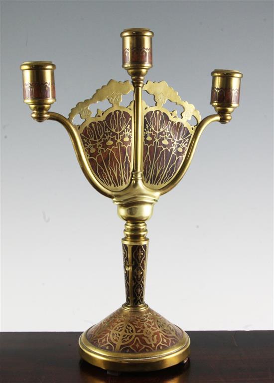 An Erhard & Sohne Schwabisch Gmund rosewood and gilt brass three light candelabrum, height 16in.